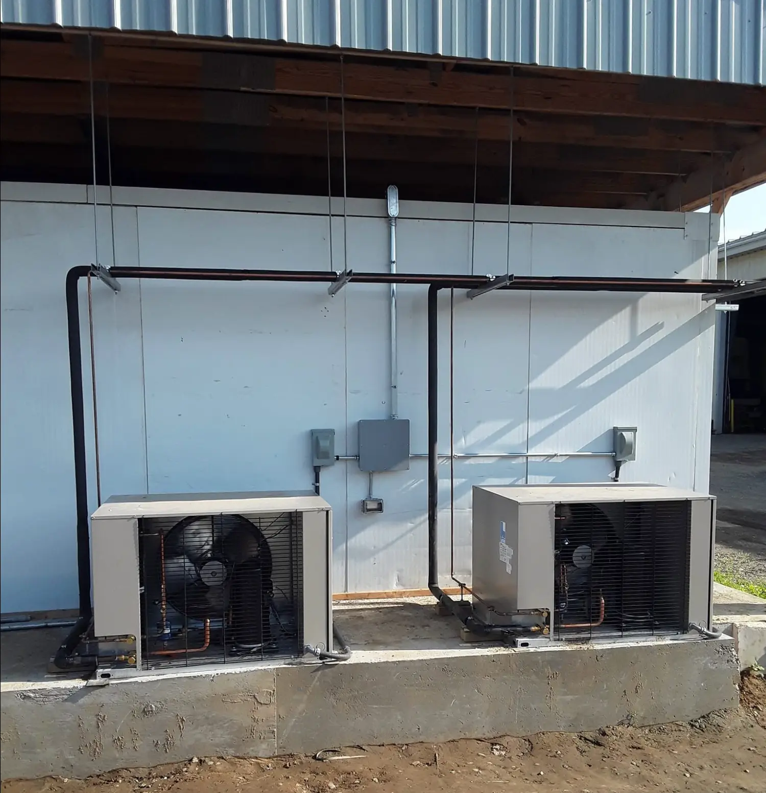 Commercial refrigeration condensing units with installed piping